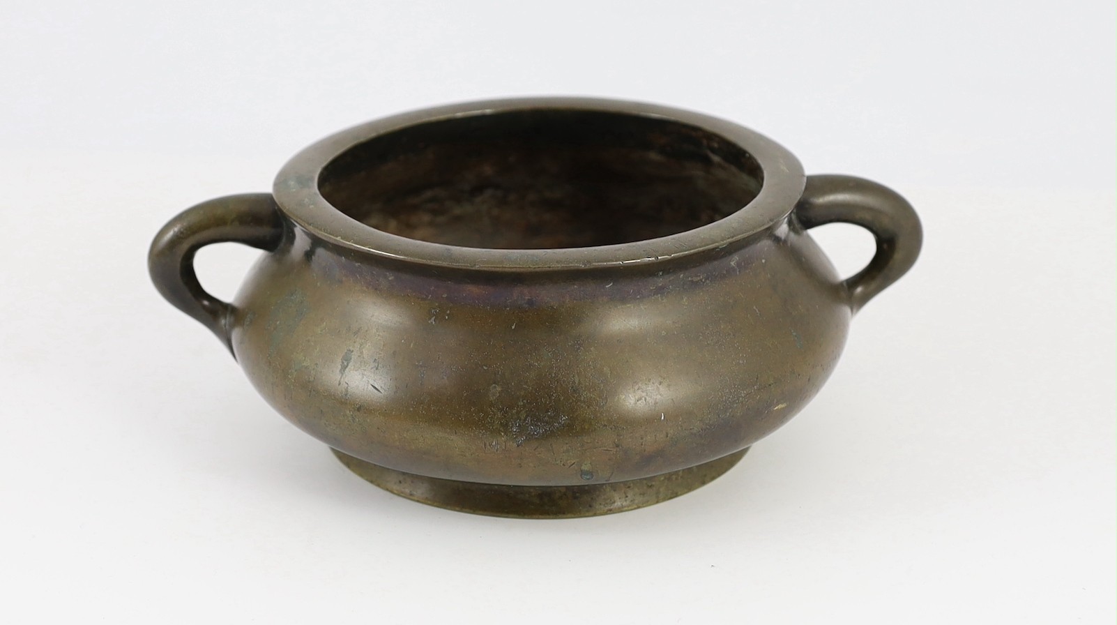 A Chinese bronze gui censer, Xuande six character mark but 19th century, 22cm across, the rim 14.2cm diameter